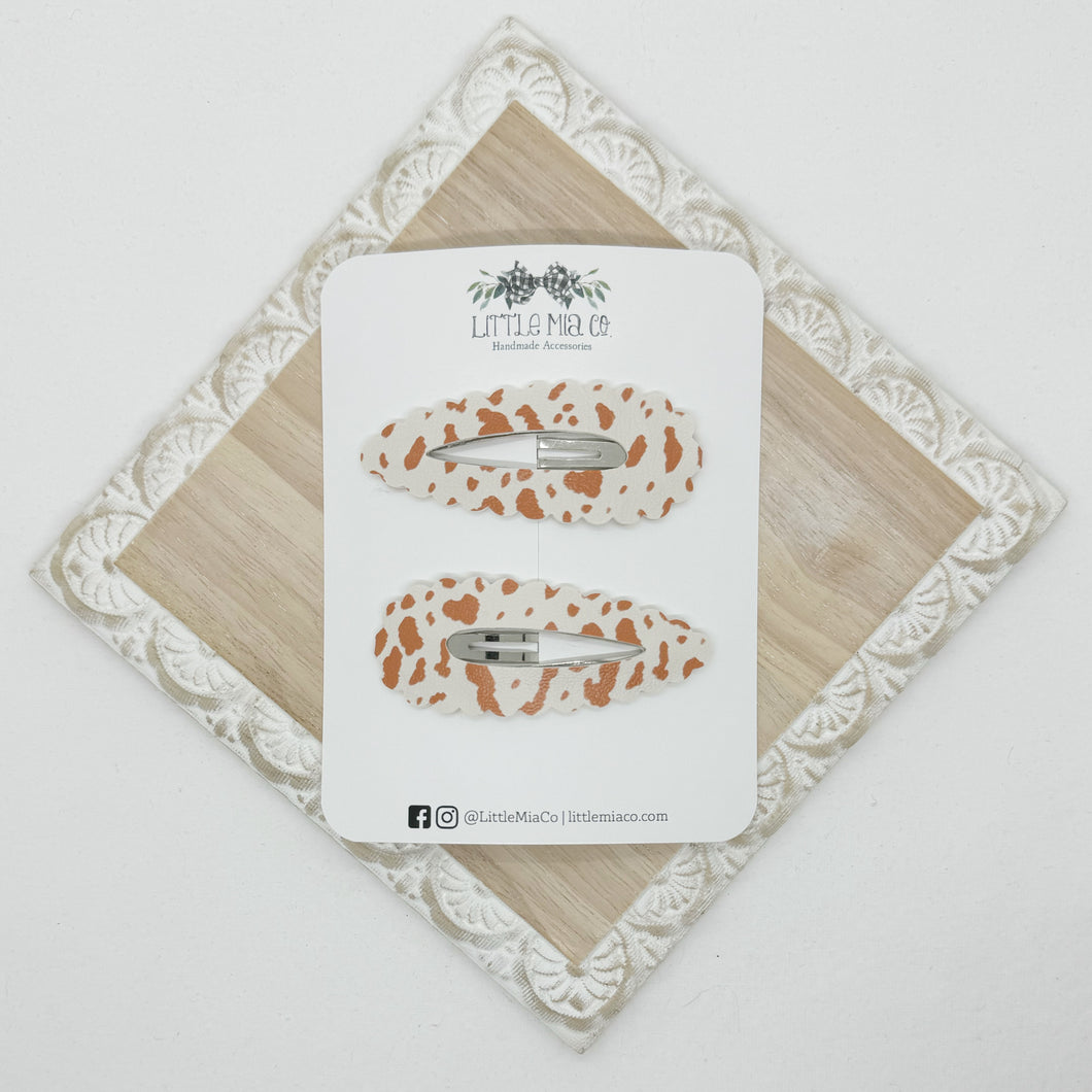 Orange Cow Print Scalloped Snap Clip Duo